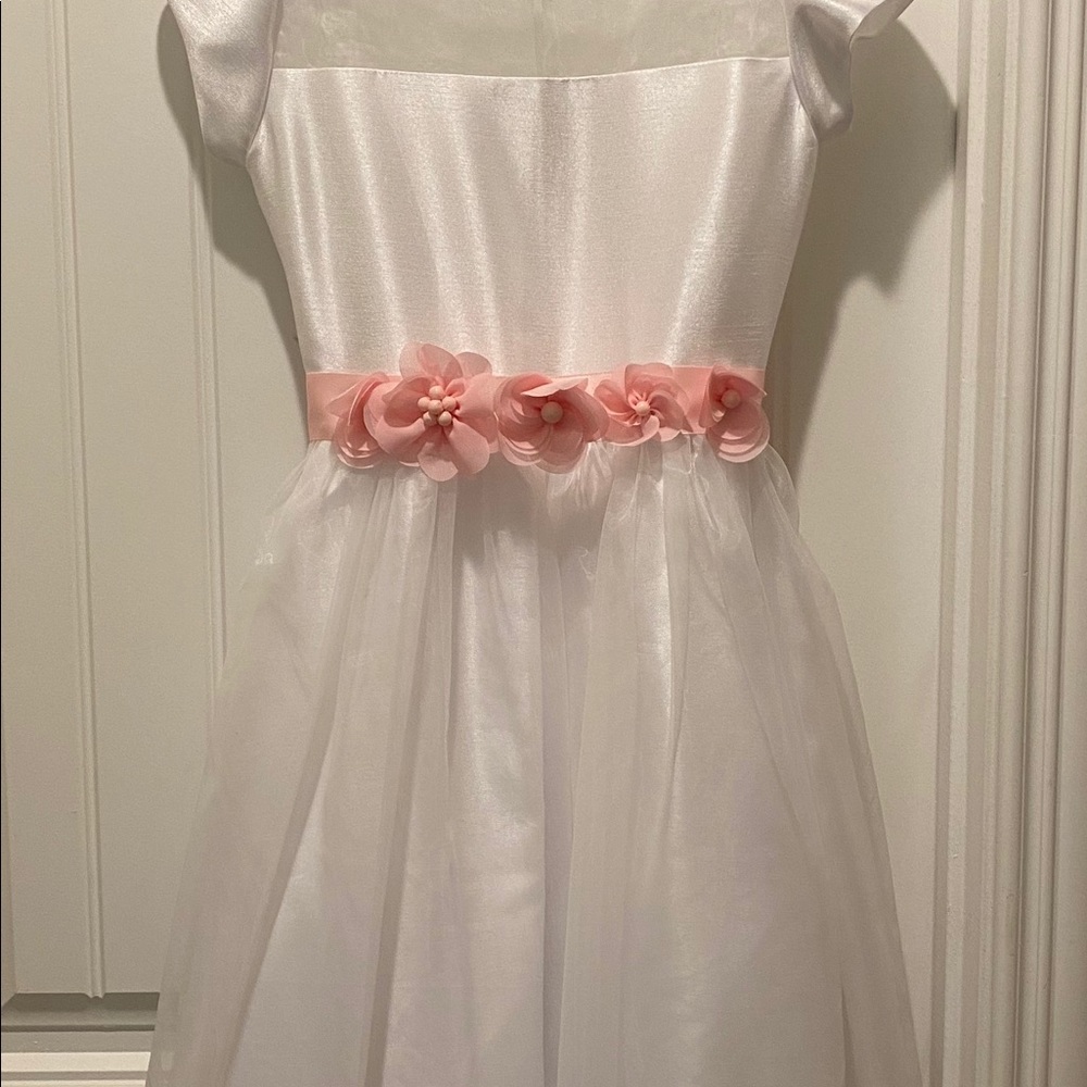 White dress with pink flower sash